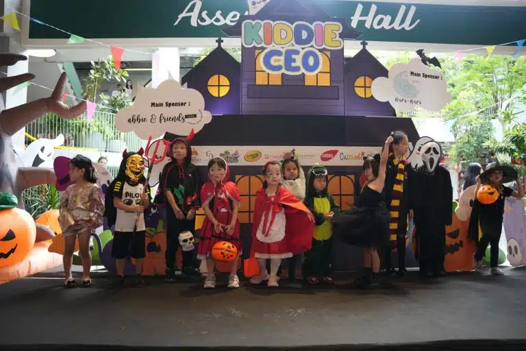 The Best Dress costume line-up in front of the Kiddie CEO house