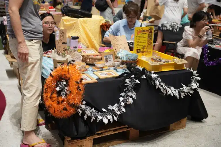 A Halloween-decorated Kiddie CEO Market booth